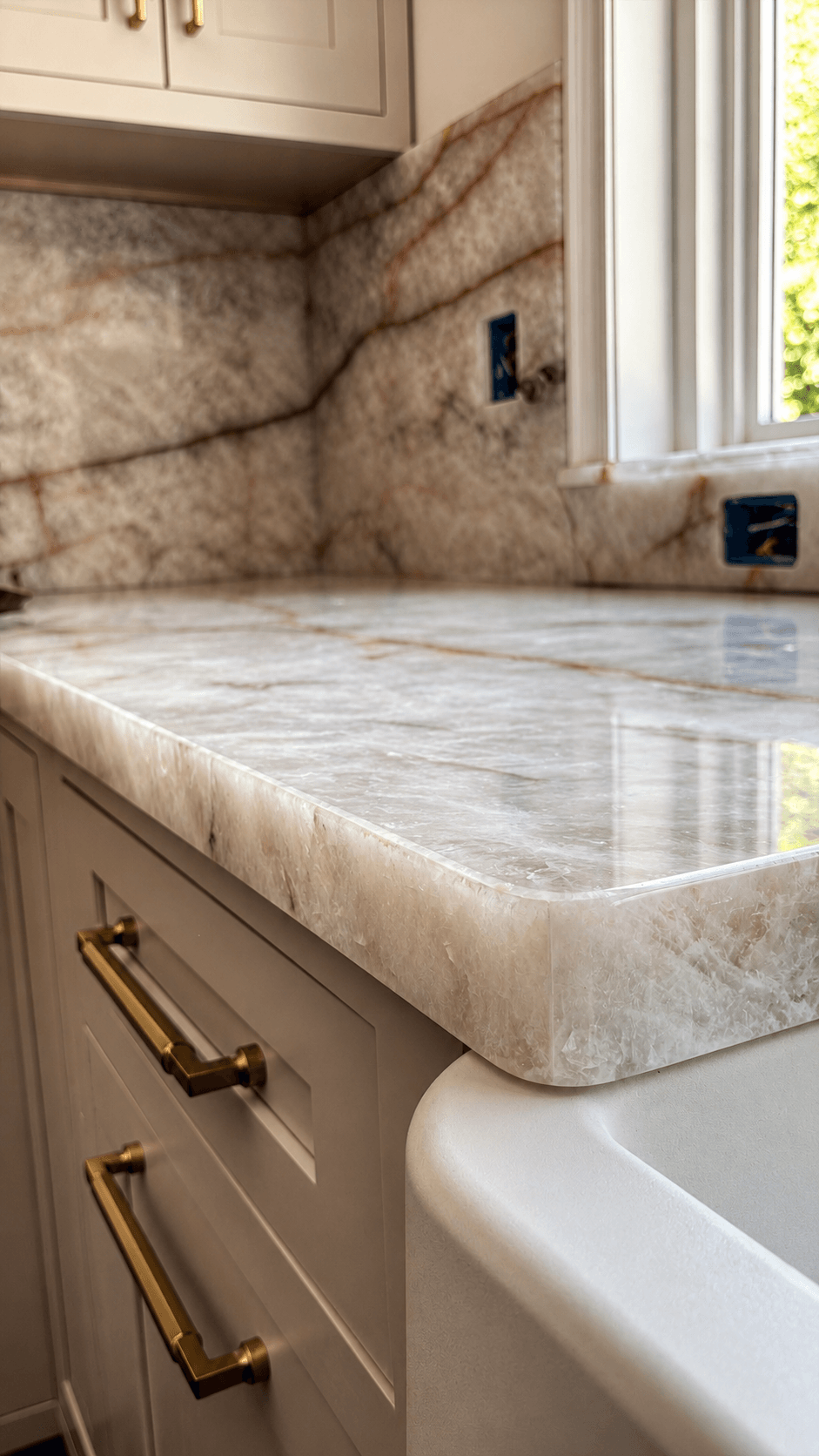 Cristallo Fire countertop edge and backsplash beside the window sill