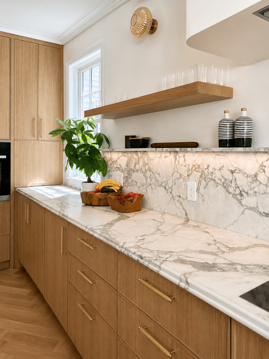 Viola Verde countertop run with integrated stone shelf and backsplash