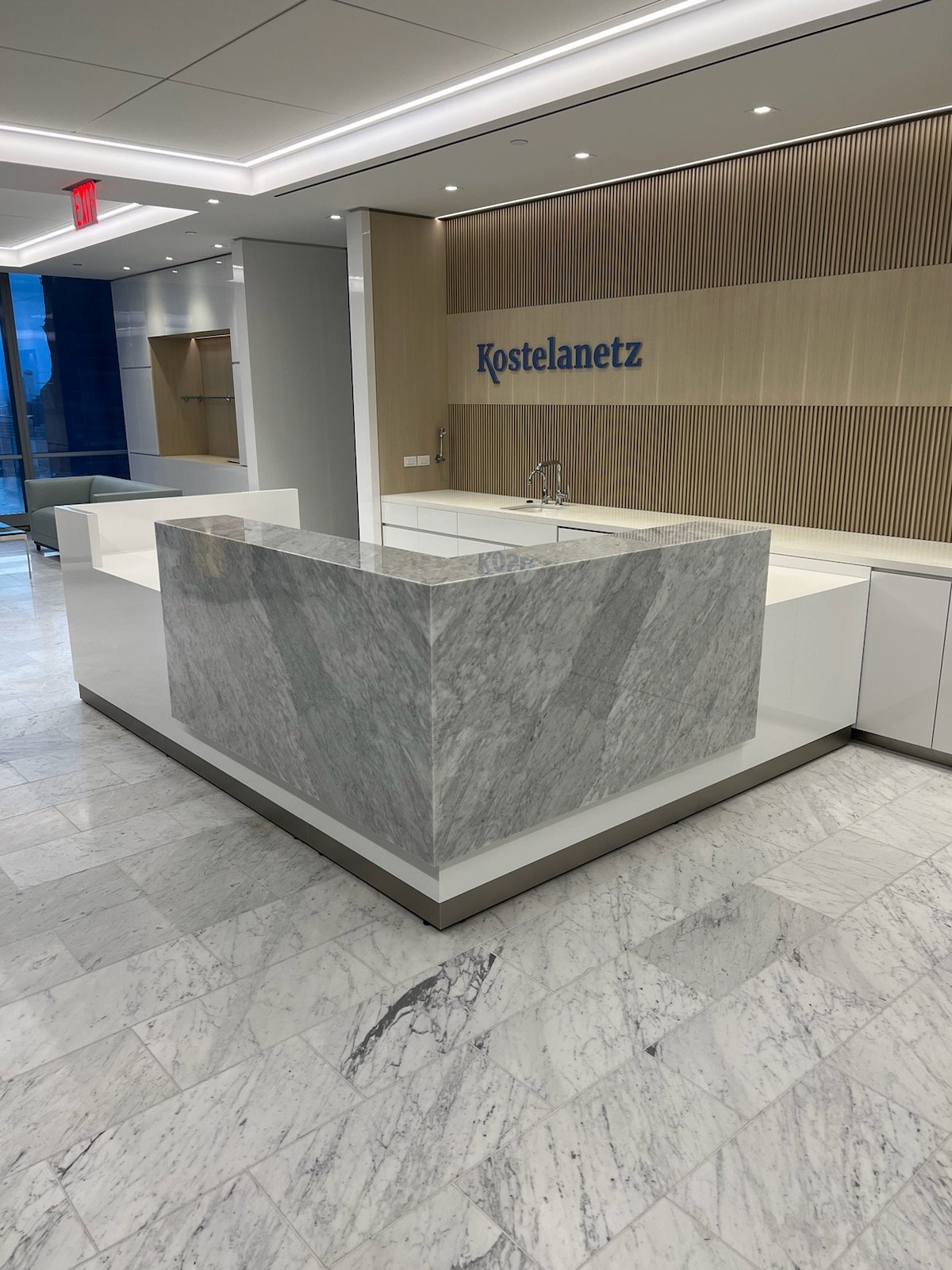 Carrara marble reception desk at Seven World Trade Center