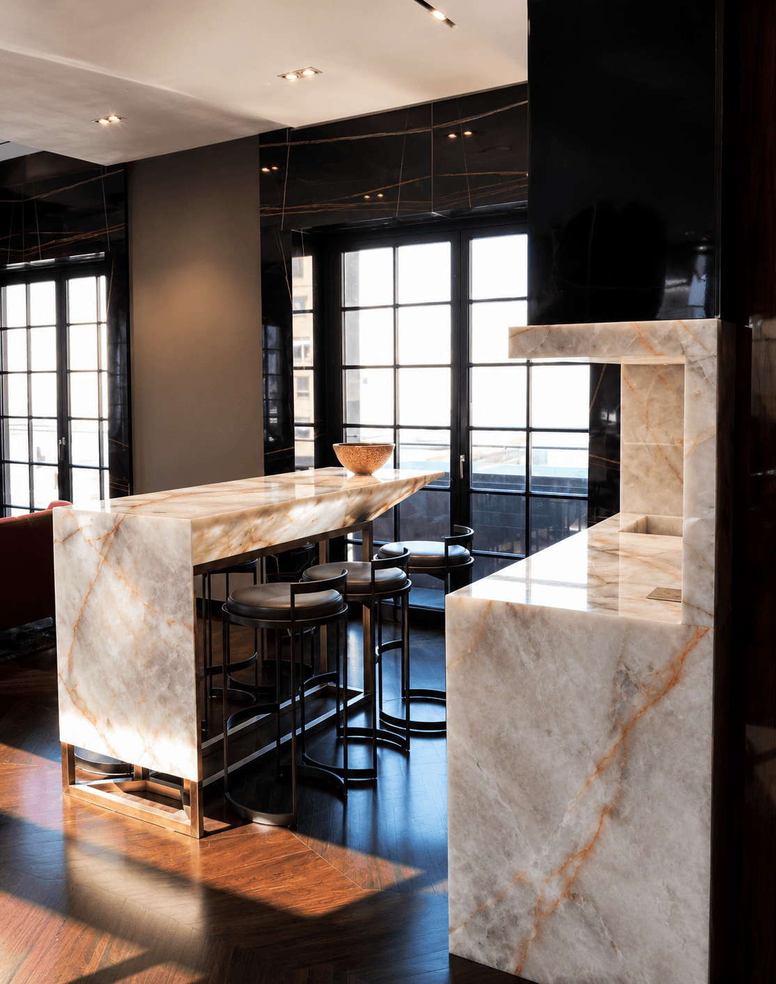 Lumix Quartzite waterfall bar island beside the back wall counter